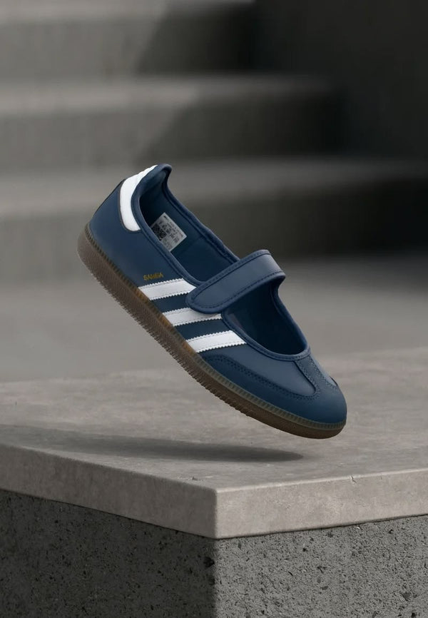 Samba Jane Shoes feature a navy leather upper and a single-strap Mary Jane