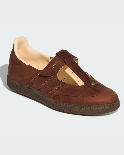 Samba Mary Jane-style strap shoes in a "Brown" or "Sand Strata" colorway, featuring a unique