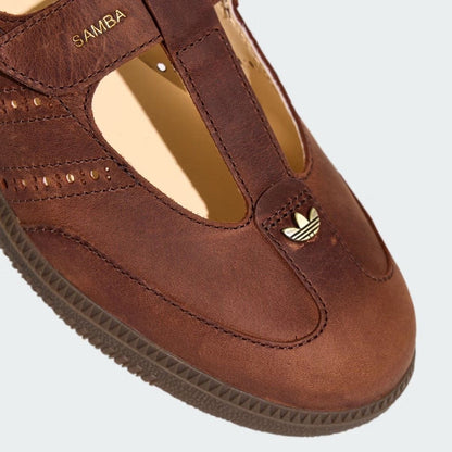 Samba Mary Jane-style strap shoes in a "Brown" or "Sand Strata" colorway, featuring a unique