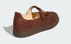 Samba Mary Jane-style strap shoes in a "Brown" or "Sand Strata" colorway, featuring a unique