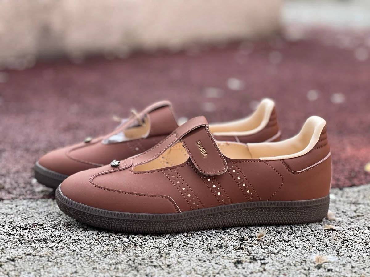Samba Mary Jane-style strap shoes in a "Brown" or "Sand Strata" colorway, featuring a unique