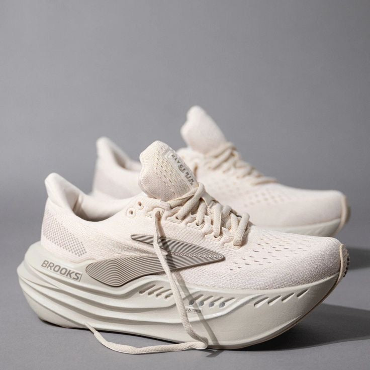 Brooks Glycerin Max neutral running shoe, highlighted by its thick, nitrogen-infused DNA Tuned midsole and Almond Peach/London Fog