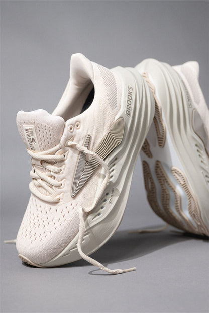 Brooks Glycerin Max neutral running shoe, highlighted by its thick, nitrogen-infused DNA Tuned midsole and Almond Peach/London Fog