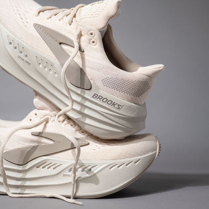 Brooks Glycerin Max neutral running shoe, highlighted by its thick, nitrogen-infused DNA Tuned midsole and Almond Peach/London Fog